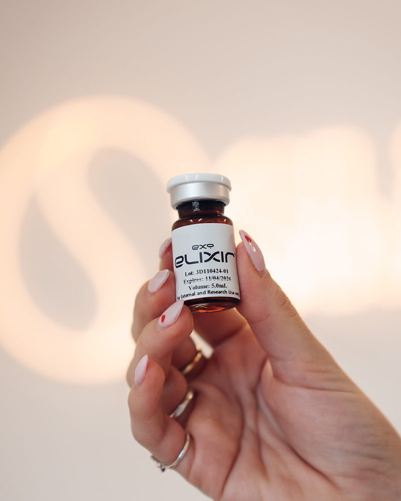 exosomes bottle in hand